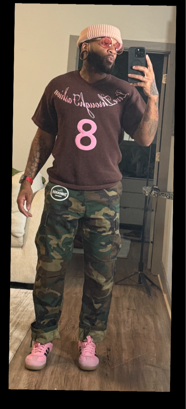 Short sleeve knit v-neck sweater in deep chocolate brown with pink logo ￼ embroidered with lucky number 8      The number 8 symbolizes infinity,   balance, and abundance, stemming from its infinite shape.